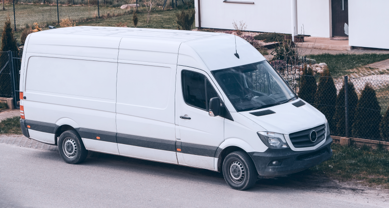 white-van-is-parked-side-road